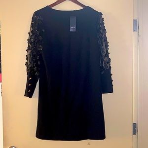 Gorgeous black kneelength dress. From Sheilay. Never worn before.